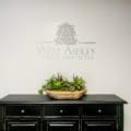 west ashley dentist office interior logo