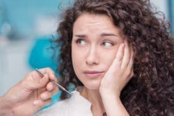 Woman suffering from toothache