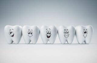 Line of cartoon teeth with faces general dentistry dentist in Charleston North Carolina
