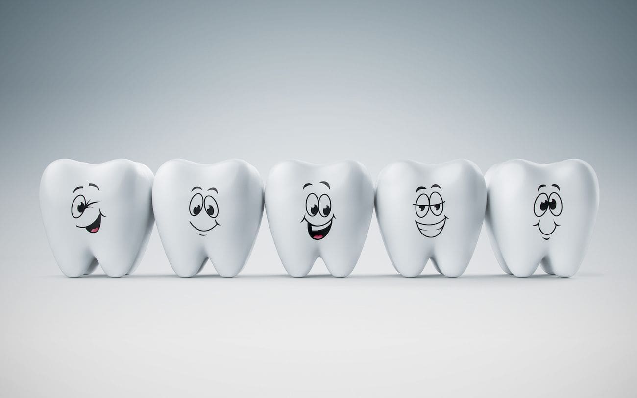 Line of cartoon teeth with faces general dentistry dentist in Charleston North Carolina